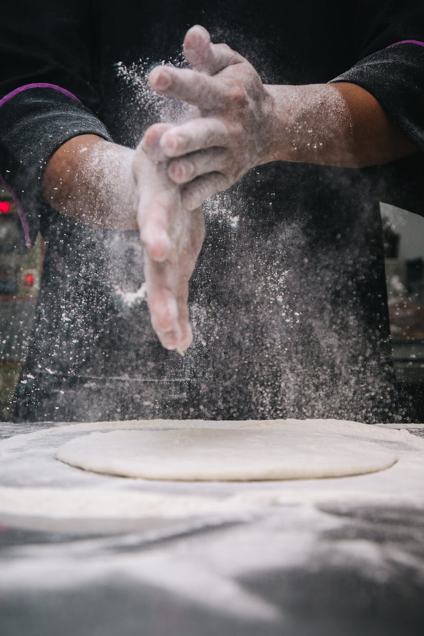 person making dough